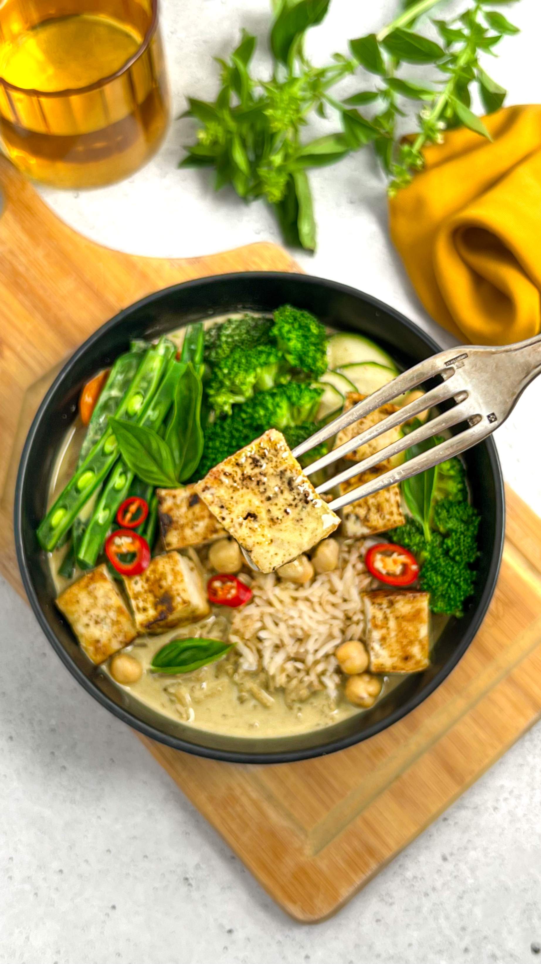 Heartful Flavours Thai Green Curry Recipe Lifestyle Shot with tofu on fork